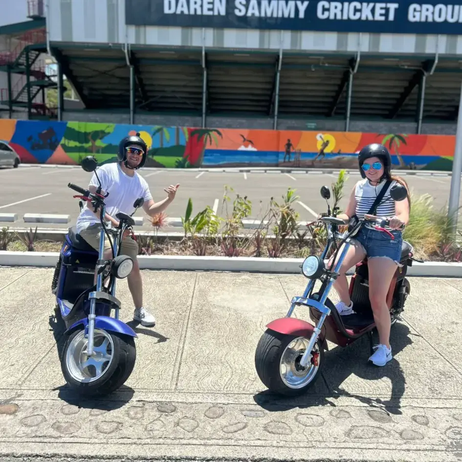 Electric scooters ready for a guided tour in Rodney Bay, St. Lucia