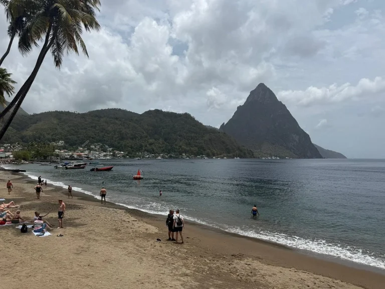 Sugar Beach with Petit Piton rising above - swim and snorkel stop on the full-day route